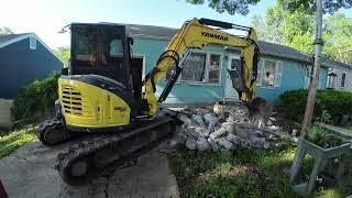 Yanmar VIO50 Tearing out Another Driveway.