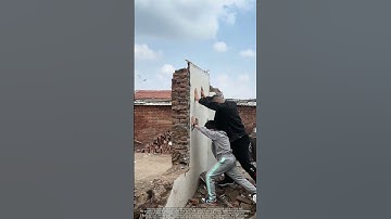 Manual Demolition : Risks of Toppling a Brick Wall by Hand