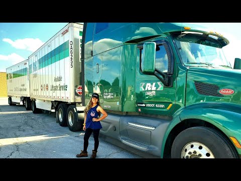 Filipina/Female Truck Driver Connecting Double Trailers