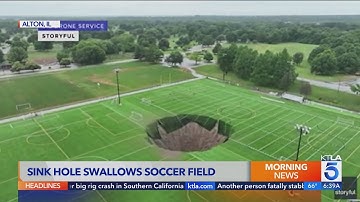 Massive sinkhole swallows soccer fields, light pole
