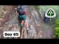 Day 65  dragons tooth in the rain   at thru hike 2024