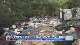Inside an Abilene homeless encampment. Litter plagues south first business