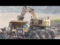 Caterpillar 6015B Excavator Loading Mud