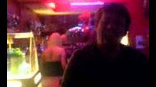 Stumpy talking at the bar