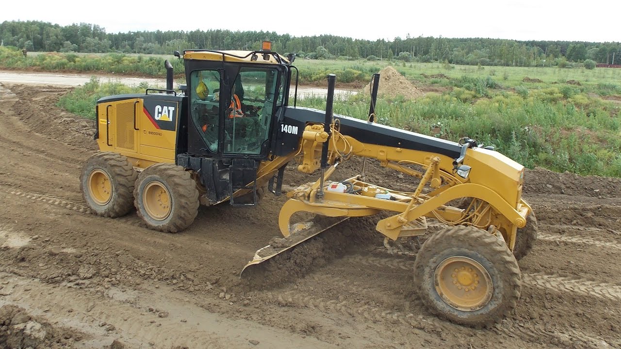 Cat 140M grading dirt YouTube