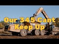 Caterpillar 345 &amp; Caterpillar 336 Excavators loading trucks