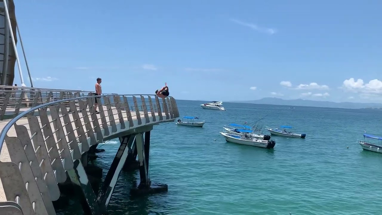 Guy attempts gainer and bumps the back of his head on railing