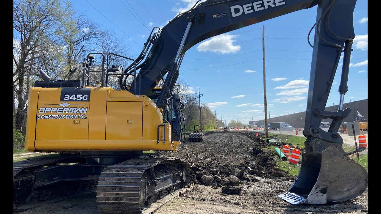 John Deere Smartgrade 345G - Storm Sewer Install - YouTube
