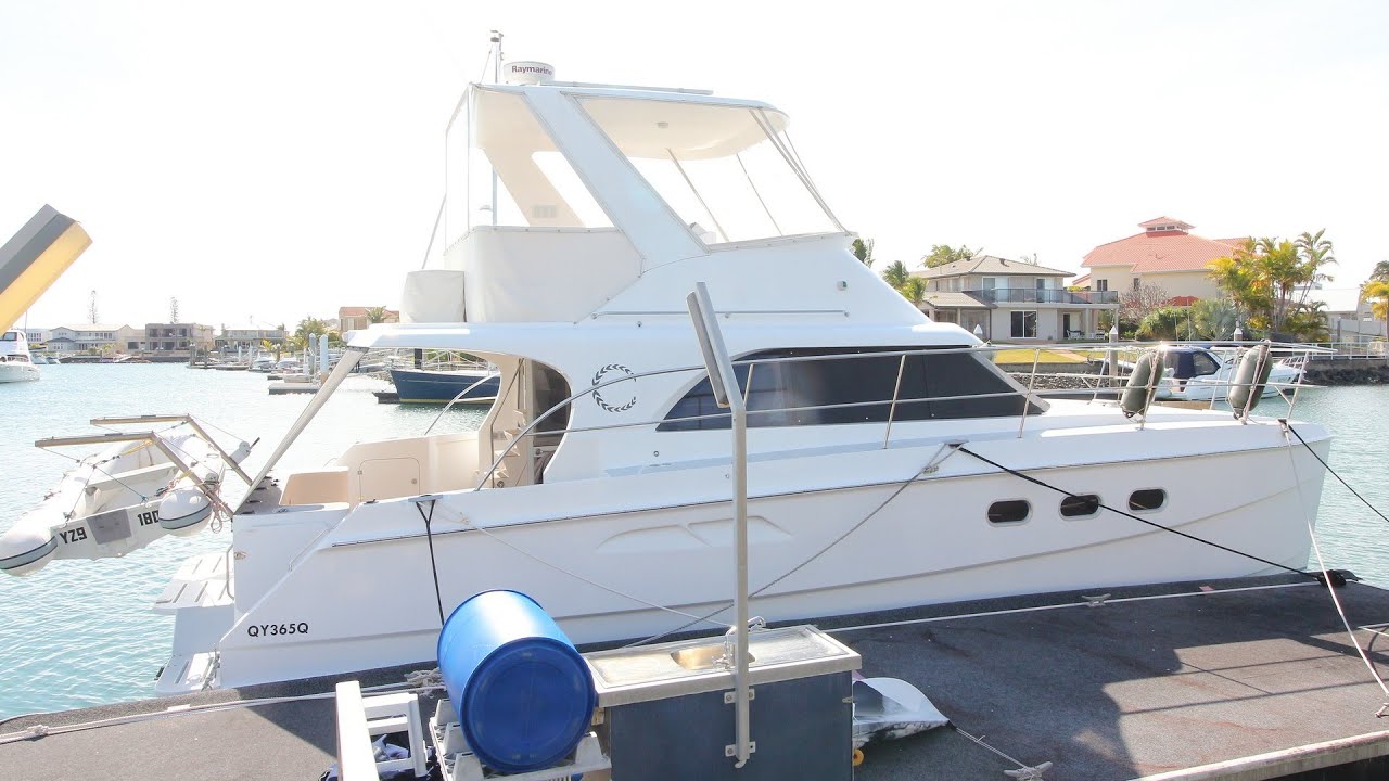 Seacrest 40 flybridge power catamaran for sale at Peter Hansen Yacht Brokers, Raby Bay
