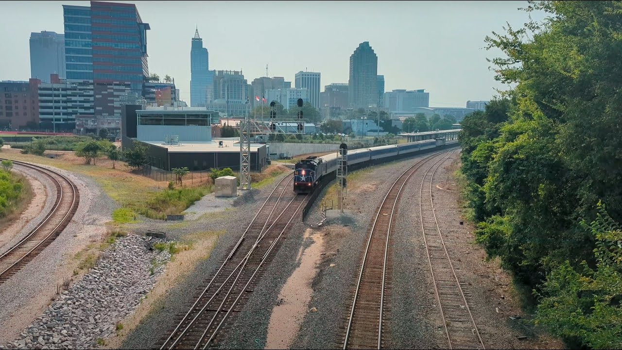a-hazy-skyline-sits-behind-raleigh-union-station-and-the-departing