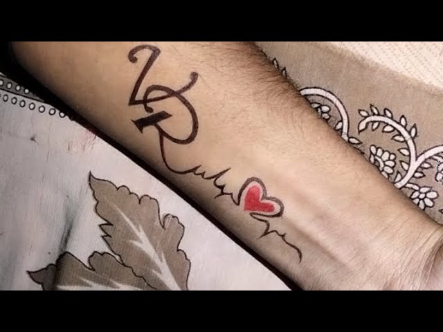 VR tattoo || VR alphabet tattoo || VR tattoo with heartbeat || | Wrist  tattoos for women, Tattoo designs, Small tattoos