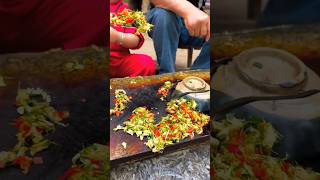 Chinese burger Stir-fried acacia flowers on slate