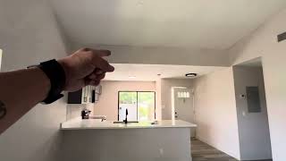 Post reinspection walk-through of 5041 NW. 11th Ave., Deerfield Beach