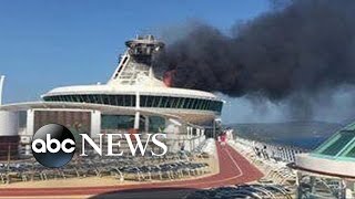 Burning Cruise Ship Arrives Into Jamaican Port