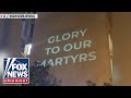 &#39;GLORY TO OUR MARTYRS&#39;: Pro-Hamas messages light up DC university library