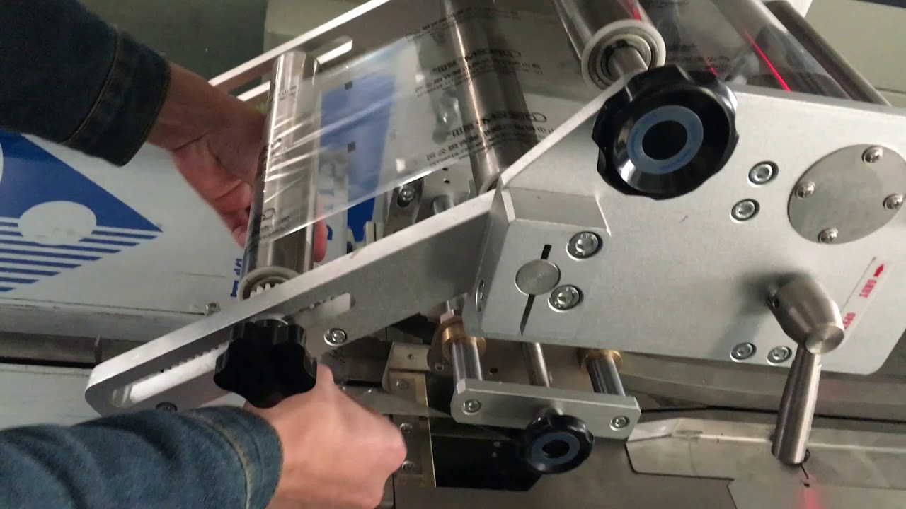 How to installation flow wrap machine Film?