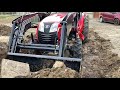 Branson 2500h tractor digging into the hard soil!