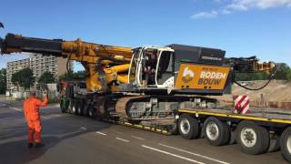 Loading the BodemBouw Cutter Soil Mix Bauer RG21 T machine on a Holtrop Low Loader