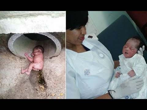Miracle baby is rescued ALIVE after being dumped in a storm drain and left to die