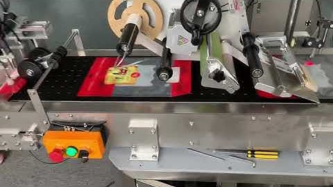 Automatic plastic pouch bag labeling machine