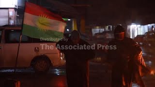 Syrian Kurds volunteer to carry guns and protect their cities at night