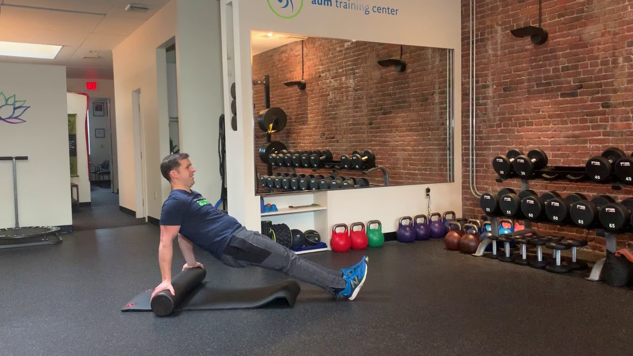 Posterior Plank on Foam Roller with Knee Tucks YouTube