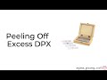 Peeling off excess DPX from a permanent slide using a brush