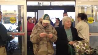 Residents wait in line as the JoAnn Fabrics holds a grand opening in Torrington.