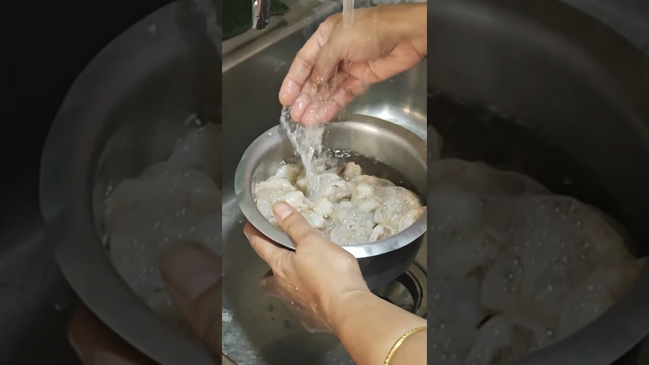 Fresh prawn being cleaned 