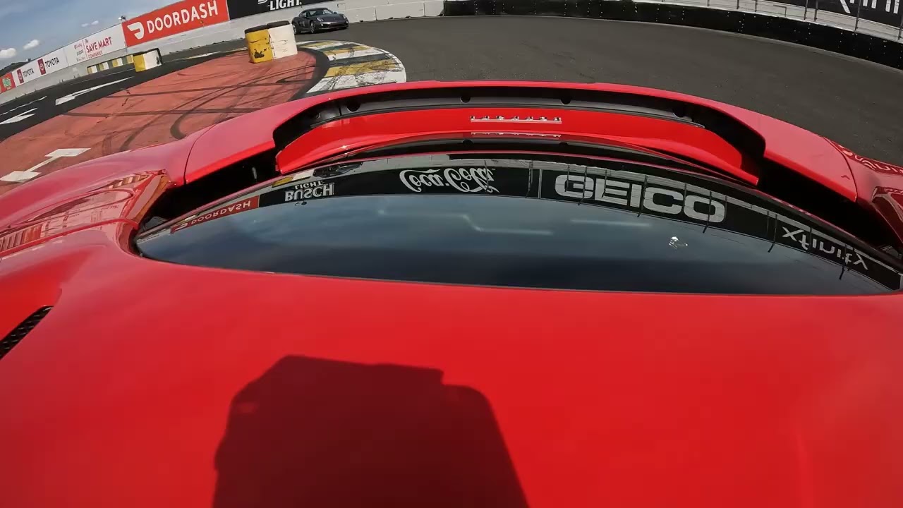 Ferrari SF90 rear spoiler action in sonoma raceway