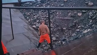 Barge unloading cobblestone early in the morning - Relaxing video