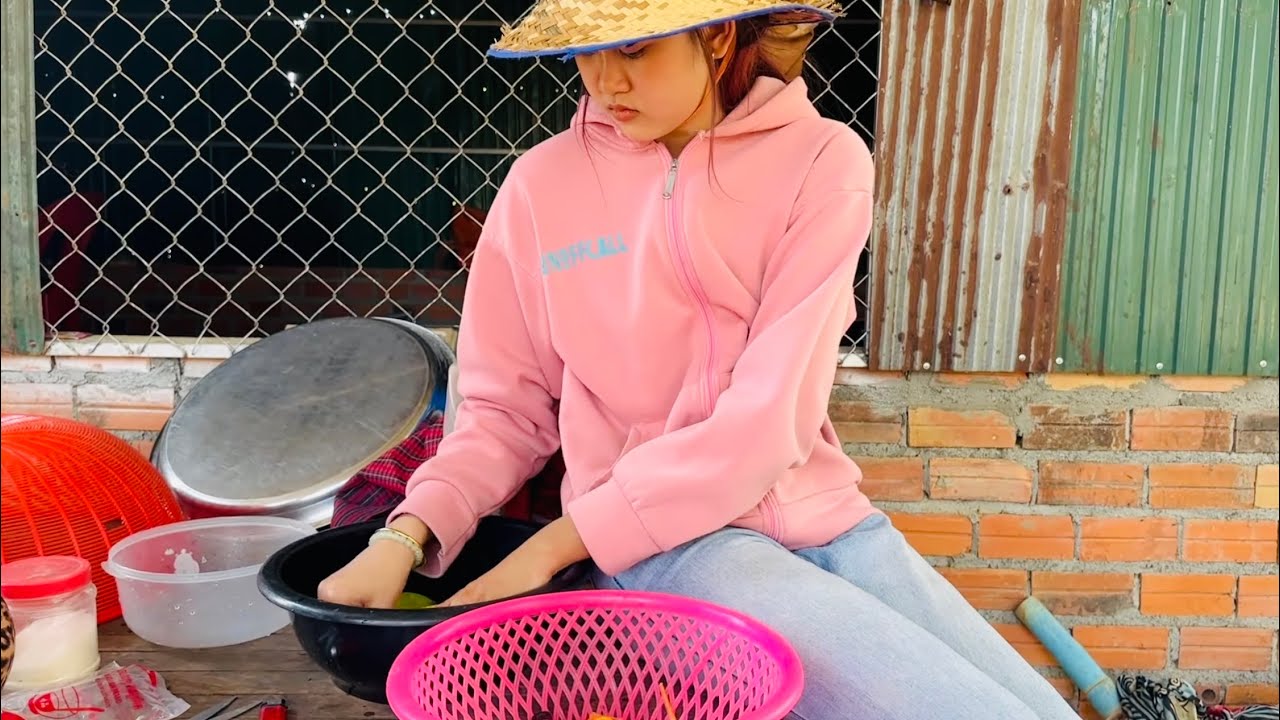 Snacking on some tropical green mangoes and papaya with a side of spicy Tuk Prahok!