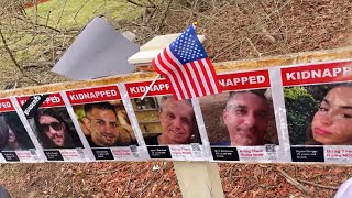 Display for hostages taken by Hamas rededicated in Mass. community after vandalism
