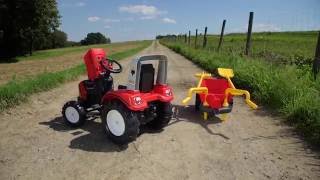 Duży czerwony traktor na pedały z otwieraną maską i przyczepą - taczkami Falk Lander 2020R