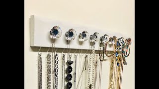 DIY White Glass Knob Jewelry Organizer #jewelryorganizer #earringholder #necklace #diyprojects #diy