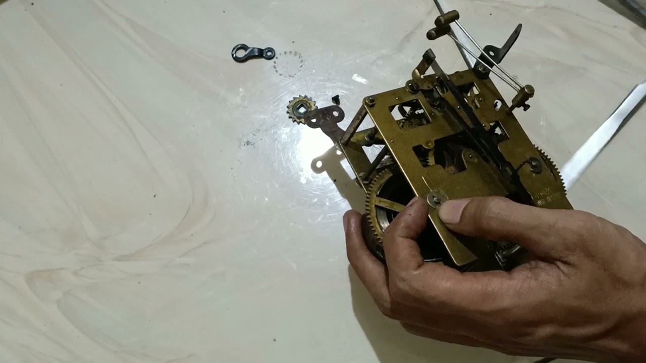 REPARASI JAM ANTIK CINA