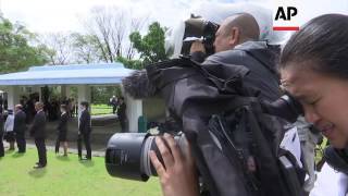 Japan's emperor visits war memorial