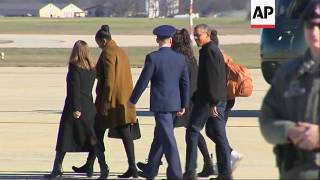 Obama Family Arrives Home from Holidays