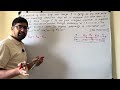 A particle of mass 1 mg and charge q is lying at the mid-point of two stationary particles kept at a