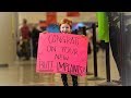 April fools surprise for dad family fun at the airport with adley and baby brothers hidden sign