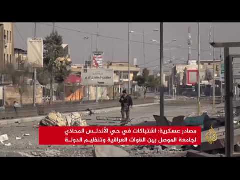 الجيش يتقدم بالموصل بغطاء جوي من التحالف