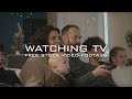 35 watching tv at home free footage family couple  friends watching television movies