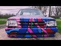 Graffiti paint job on a bodydropped Mazda minitruck