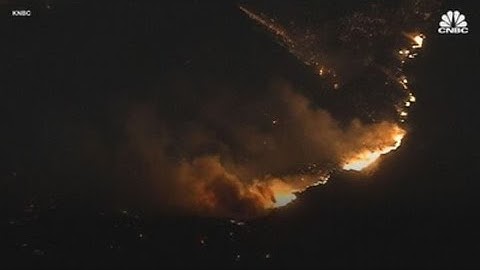 California wildfire explodes in size overnight, forcing thousands to evacuate