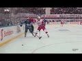 Chris chelios grabs tie domis toque and throws it at him