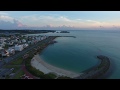 {4K}かりゆし58の歌を思い出します、糸満潮崎ビーチの夕日の場面  Okinawa Drone Footage  動画 素材 観光