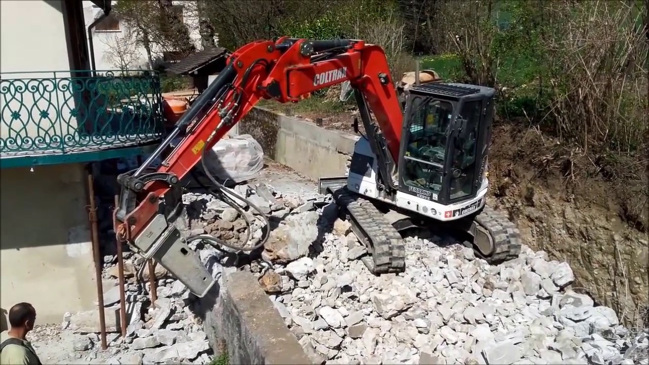 Midi-pelle CX 90CD radiocommandée