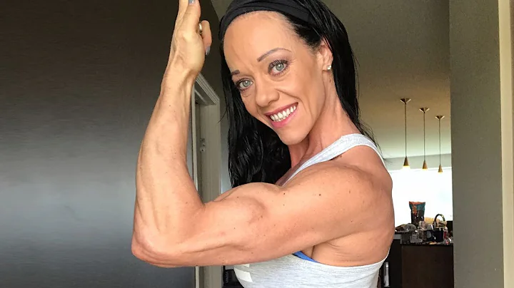 44 years young muscle woman Guinn Field flexing he...