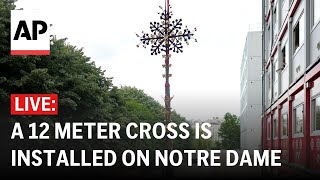Notre Dame LIVE: A 12 meter cross is installed on the cathedral’s rooftop