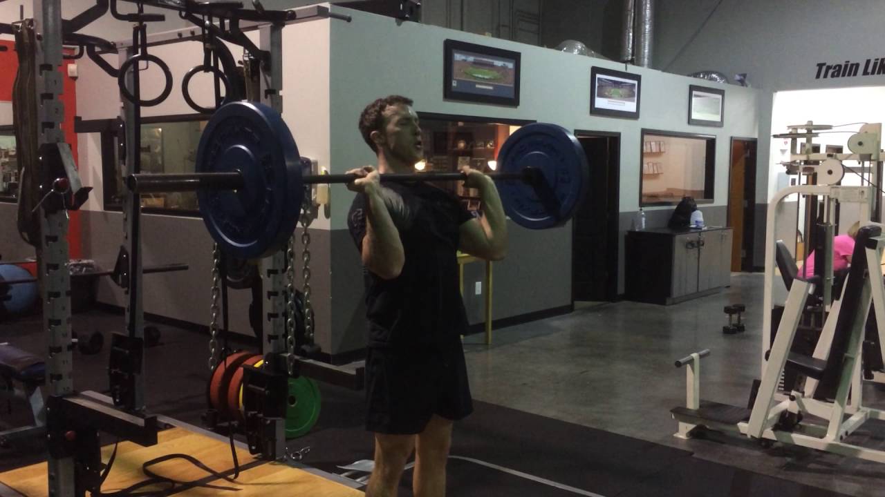 Eyes-Closed Standing Military Press overhead press bodybuilding